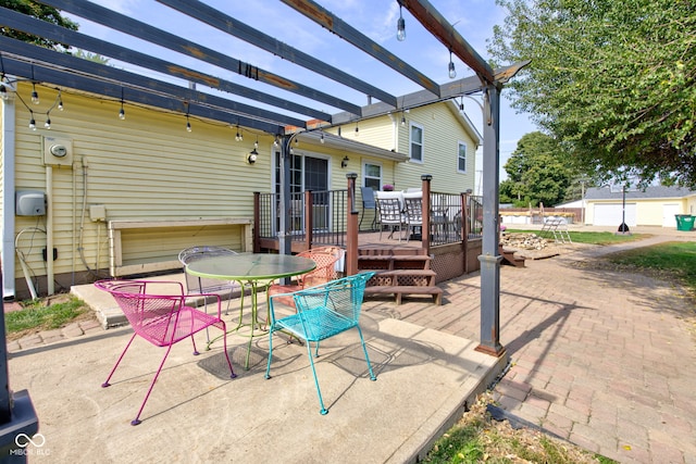 view of patio / terrace featuring a deck and a pergola