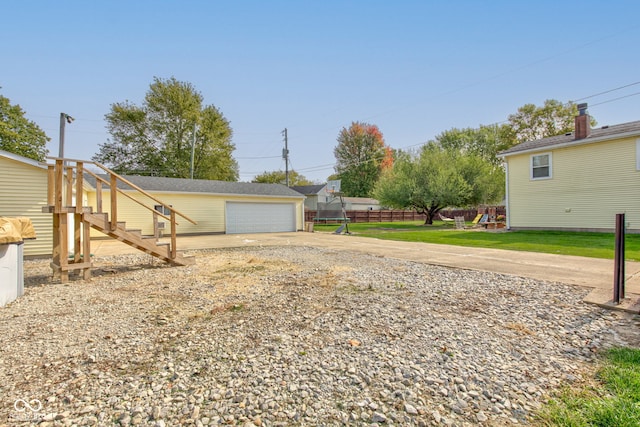 view of yard featuring a garage