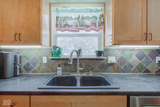 kitchen with backsplash and sink