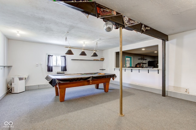 recreation room featuring carpet, a textured ceiling, and pool table