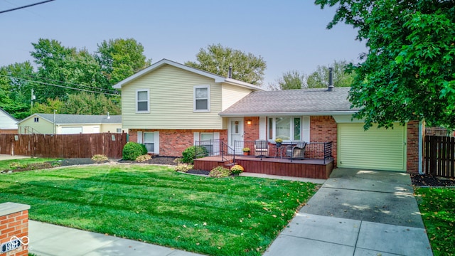 split level home featuring a front lawn