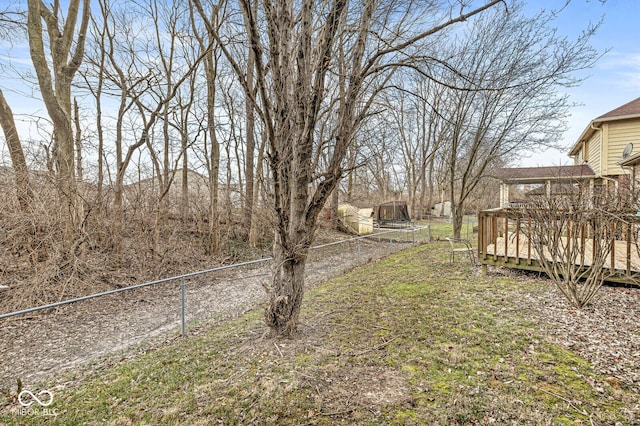 view of yard featuring a wooden deck