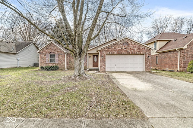 view of front of house featuring a front yard and a garage