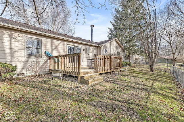 rear view of house featuring a deck