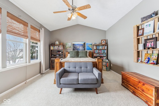 sitting room featuring lofted ceiling, light colored carpet, and ceiling fan