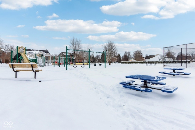 view of property's community with a playground