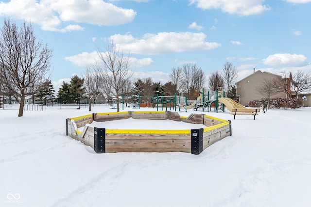 view of property's community with a playground