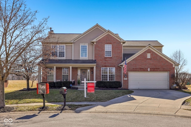 front facade featuring a garage and a front yard