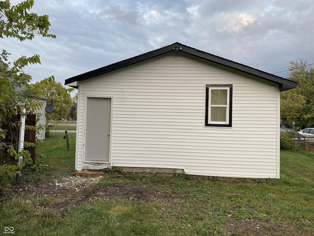 view of property exterior featuring a yard