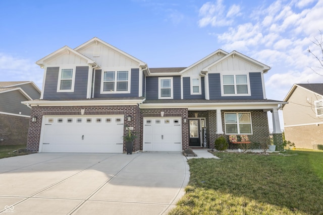 view of front of property with a garage and a front yard