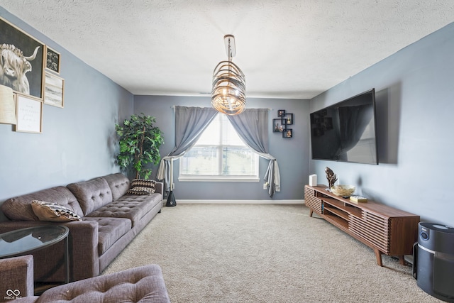 carpeted living room with a textured ceiling