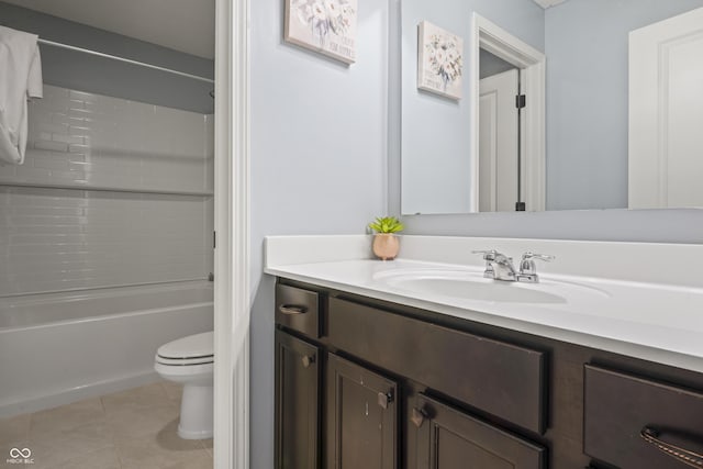 full bathroom with tile patterned floors, vanity, toilet, and shower / tub combination