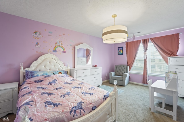 carpeted bedroom with a textured ceiling