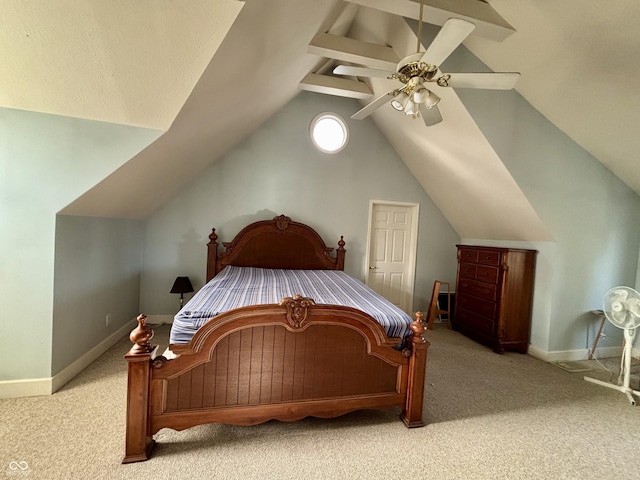 bedroom with carpet floors, vaulted ceiling, baseboards, and ceiling fan