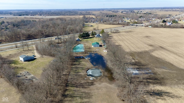 birds eye view of property featuring a rural view