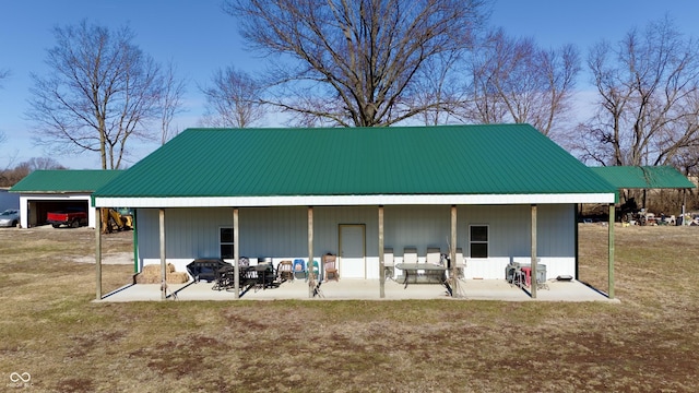 exterior space with a yard and a patio