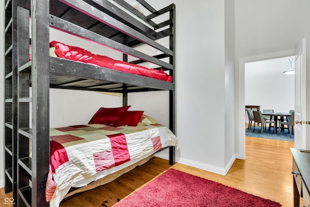 bedroom featuring hardwood / wood-style flooring