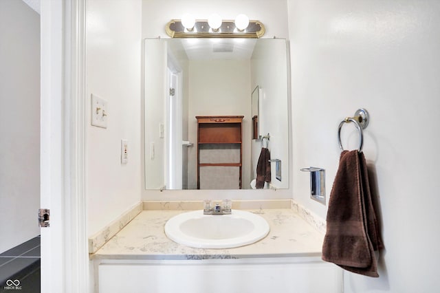 bathroom featuring vanity