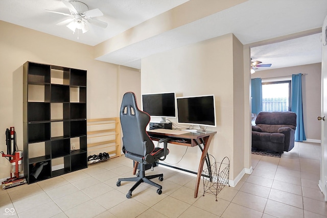 office area featuring ceiling fan and light tile patterned floors