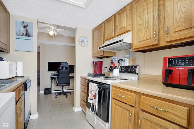 kitchen with a textured ceiling, ceiling fan, light tile patterned floors, and white appliances