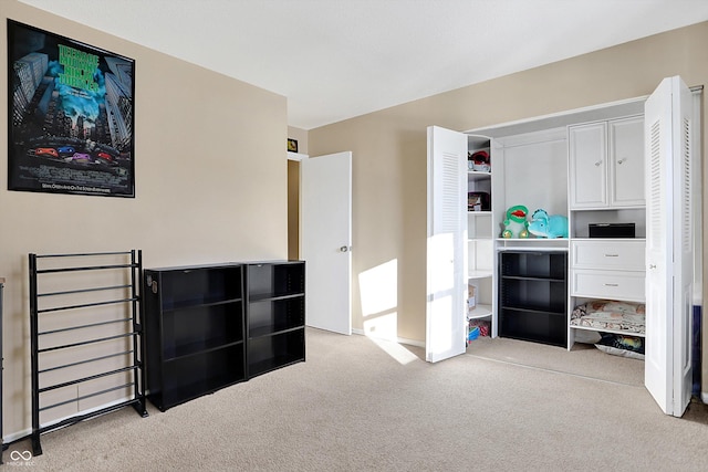 bedroom with light colored carpet