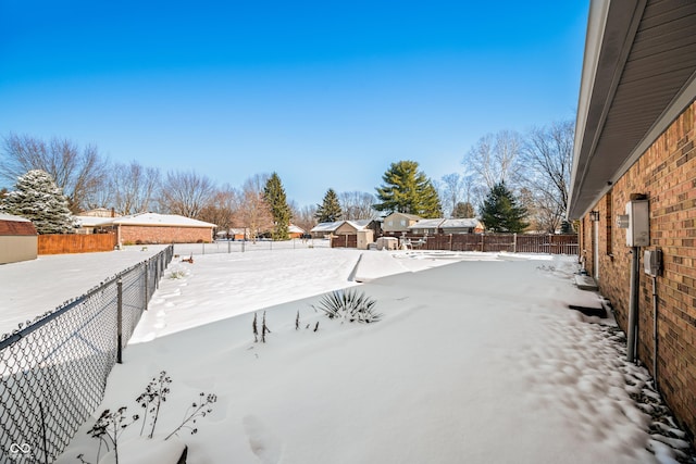 view of snowy yard