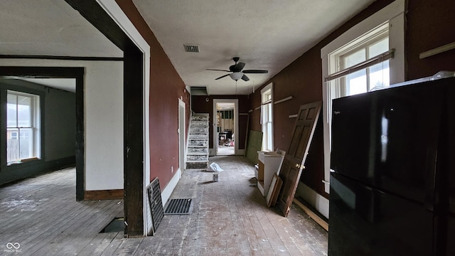 interior space featuring a textured ceiling