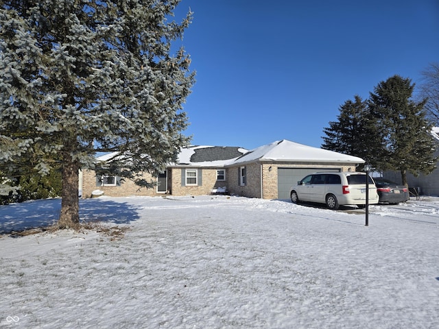 single story home with a garage