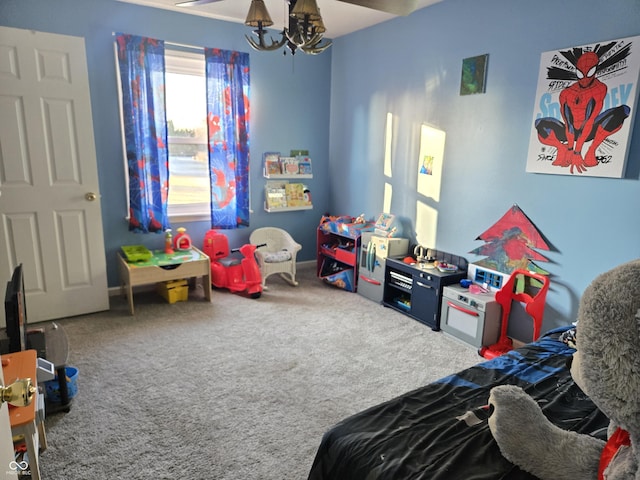 carpeted bedroom with a notable chandelier