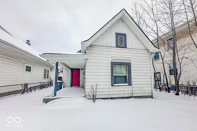 view of snow covered property