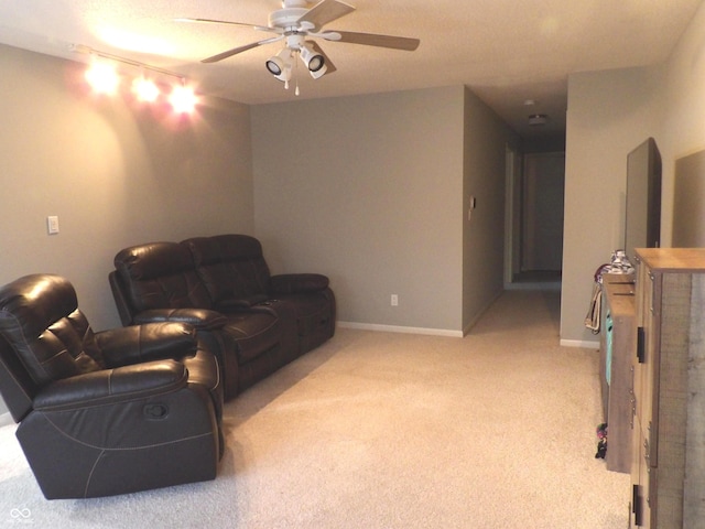 living room featuring ceiling fan and light carpet