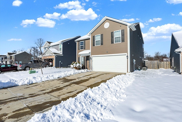 front of property with a garage