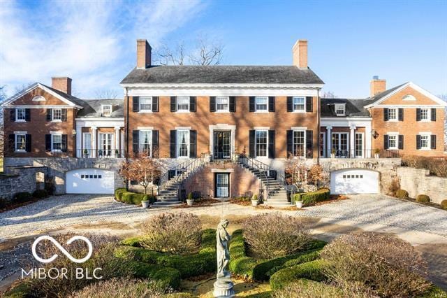 colonial home with a garage