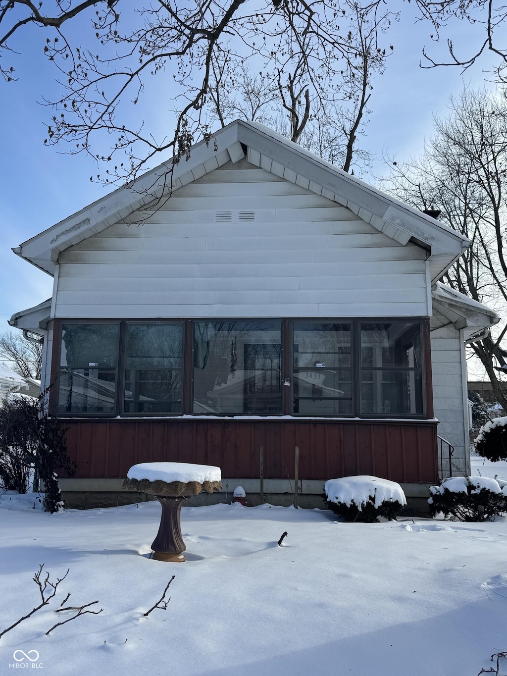 exterior space with a sunroom