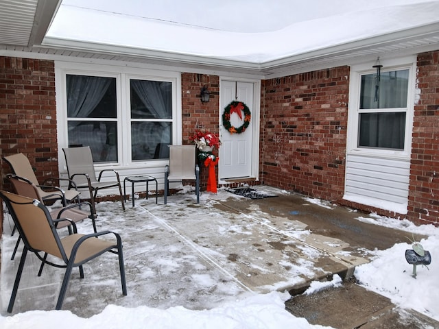 view of snow covered patio