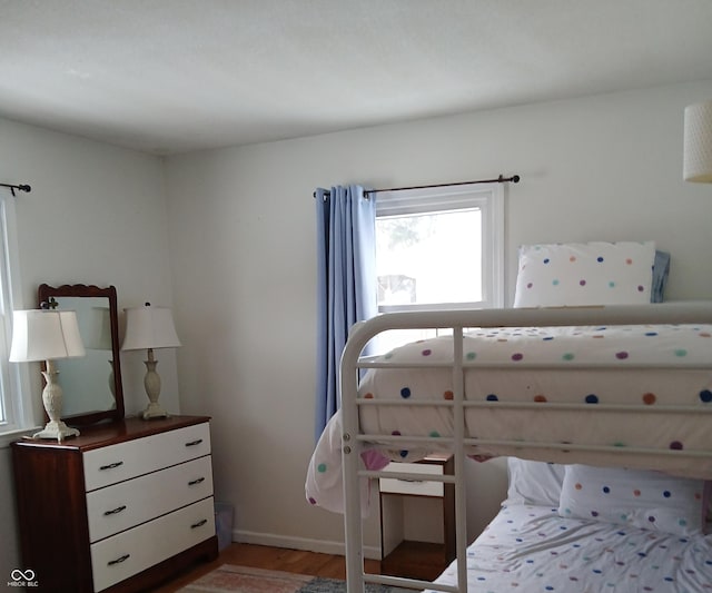 bedroom featuring wood-type flooring