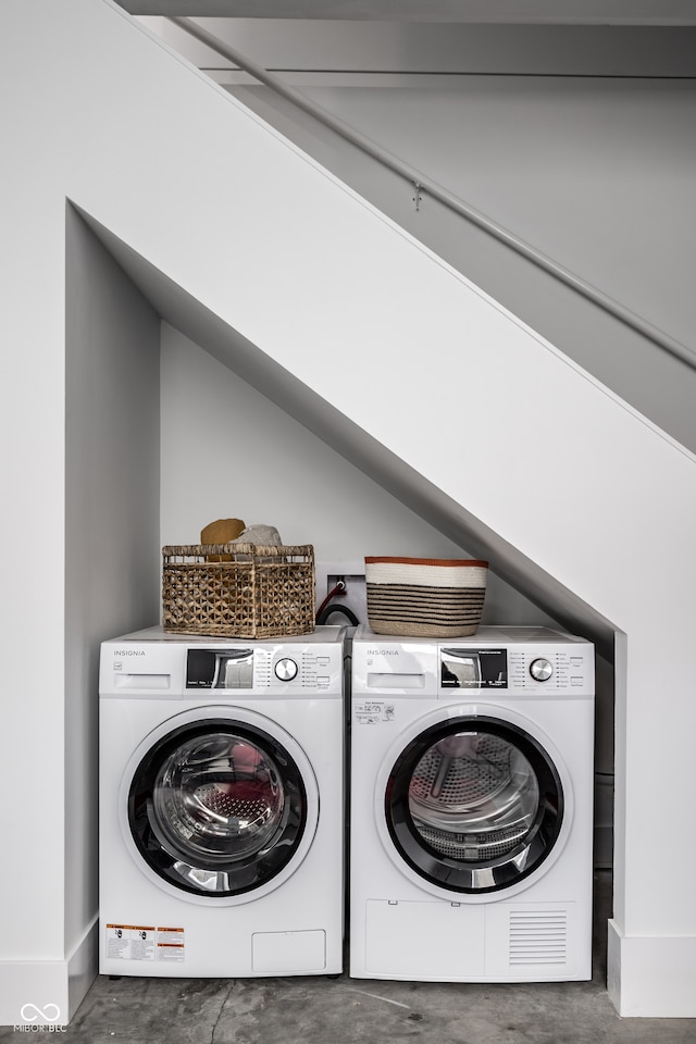 laundry area with washer and clothes dryer