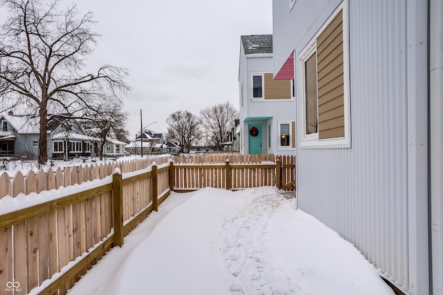 view of yard covered in snow