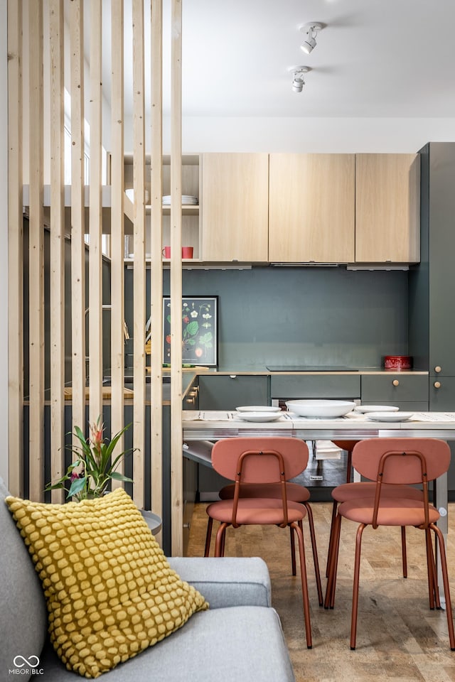 kitchen featuring light brown cabinetry