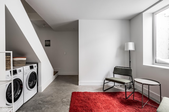 washroom featuring washer and dryer