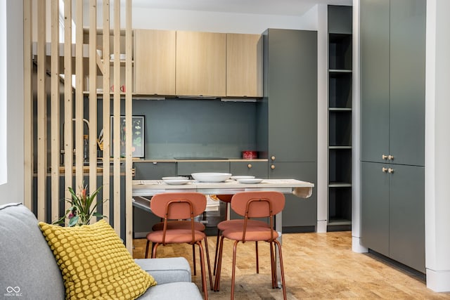 kitchen featuring light brown cabinets