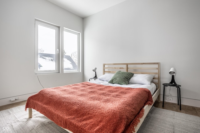 bedroom featuring multiple windows