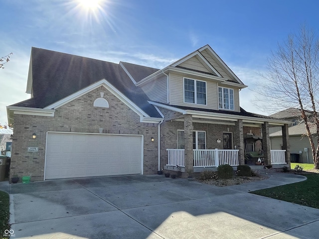 view of front of property with covered porch and central AC