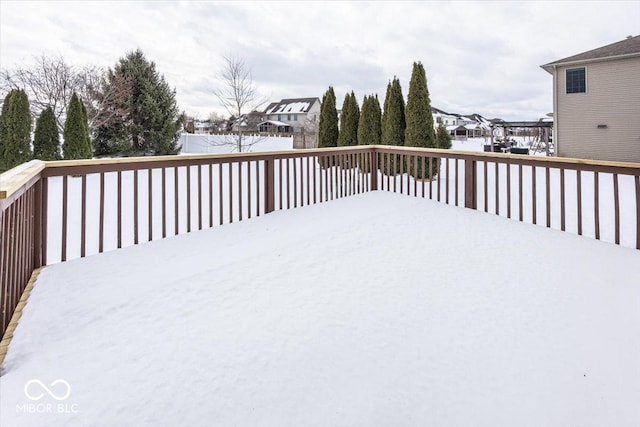 view of snow covered deck