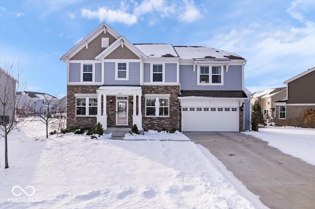 view of front of property with a garage