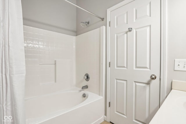 bathroom with vanity and shower / bathtub combination with curtain