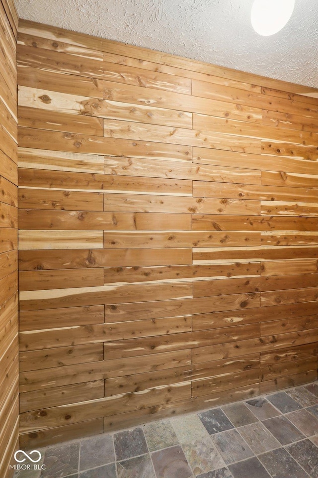 details featuring wood walls