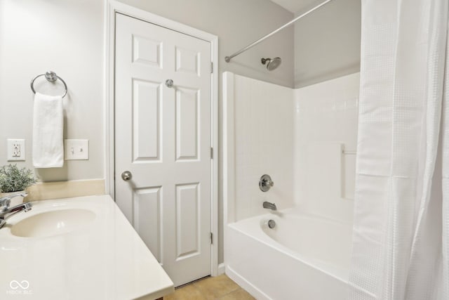 bathroom featuring tile patterned floors, vanity, and shower / bath combination with curtain