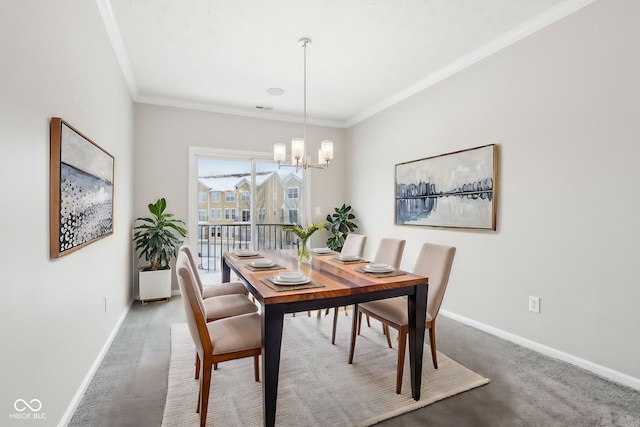 dining area with ornamental molding and a notable chandelier