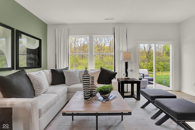 living room with light hardwood / wood-style floors